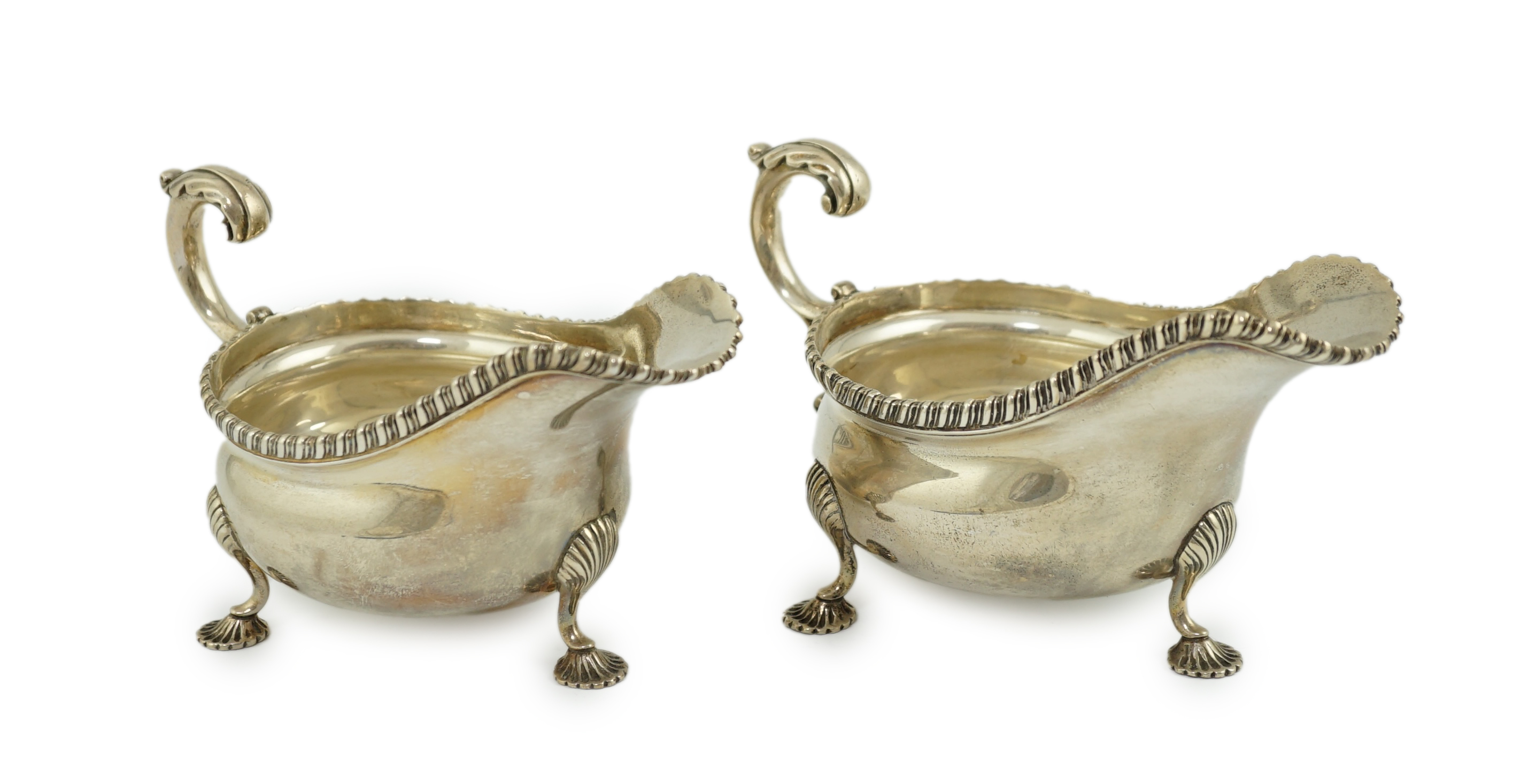 A pair of Edwardian silver sauce boats, by Goldsmiths & Silversmiths Co Ltd